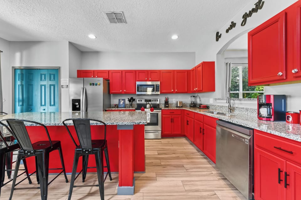 KITCHEN:  Minnie Themed Fully Equipped Kitchen with Seating for 4 at Kitchen Island