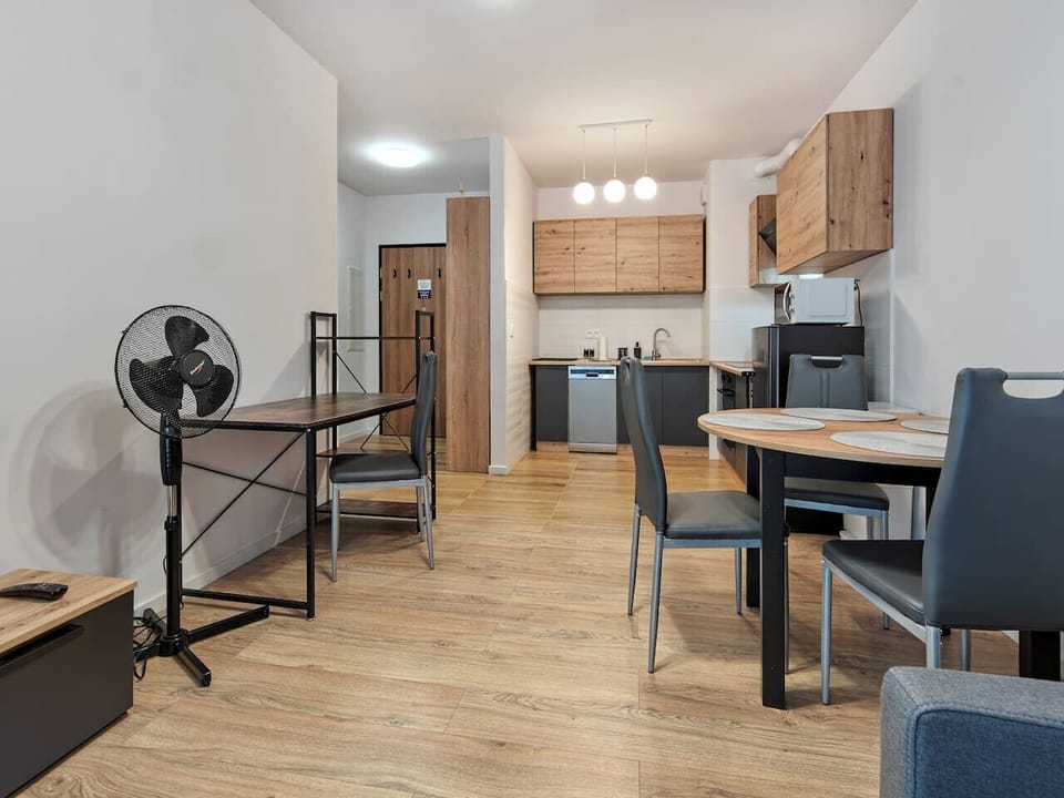 Living Room with Sofa Bed, Smart TV and Working Desk | Book Now with RENTUJEMY.COM