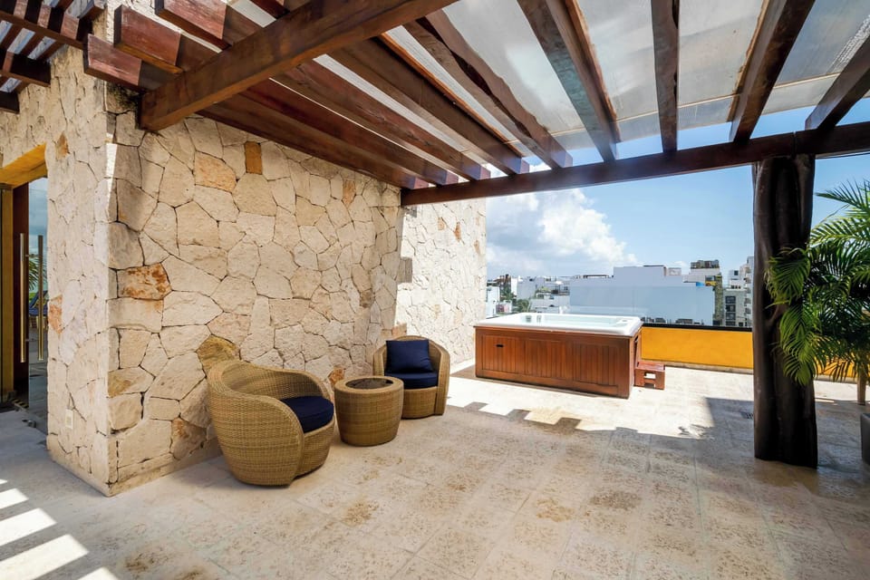 Enjoy the sunset from our terrace oasis.