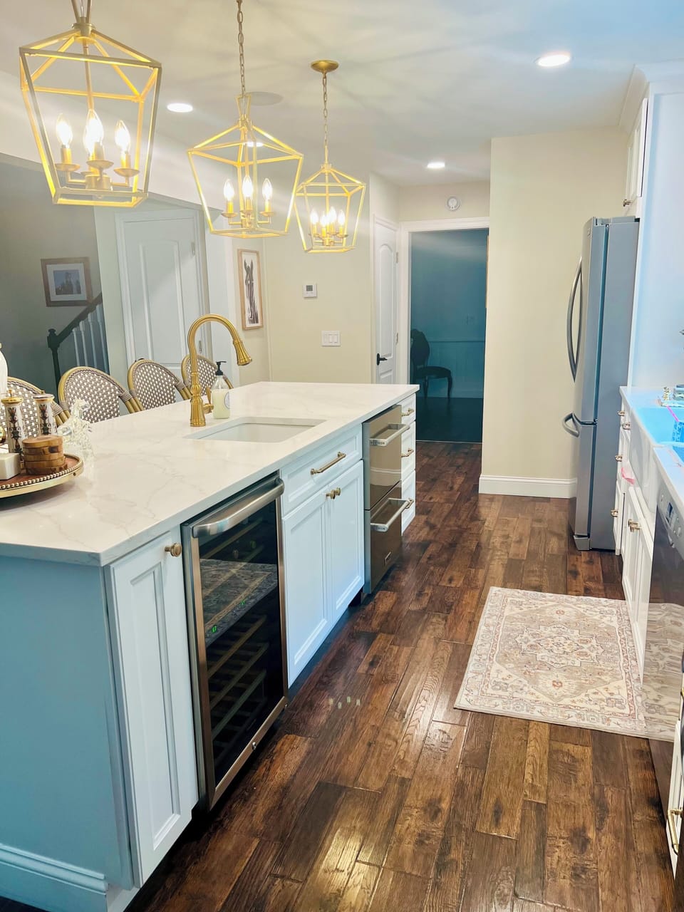 Full kitchen with beautiful island.  Also wine cooler and pull out cooler
