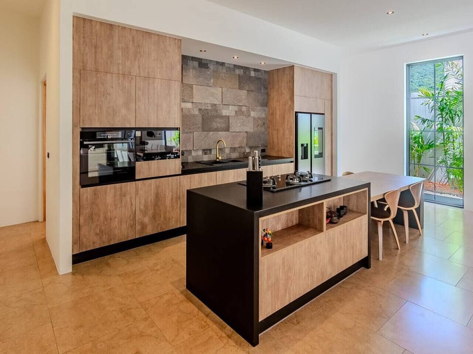 Cathedral ceiling living area with modern furnishings at Villa Mangosteen, Koh Samui