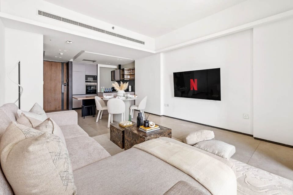 Stylish living room with comfortable seating and a warm, inviting atmosphere.