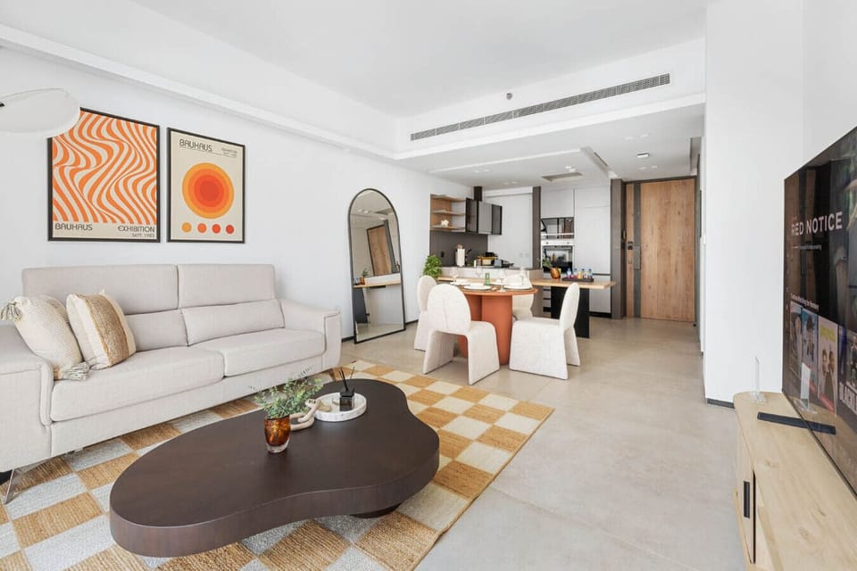 Stylish living room with comfortable seating and a warm, inviting atmosphere.