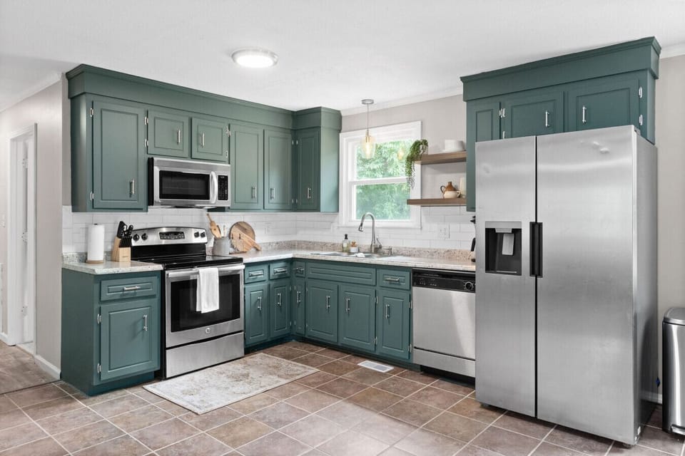 Fully equipped kitchen with modern upgrades and timeless charm.