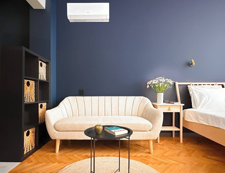 Enjoy a bright, stylish room where you can rest, read, or stream your favorite shows. Curious about the Smart TV or AC? Message us anytime!