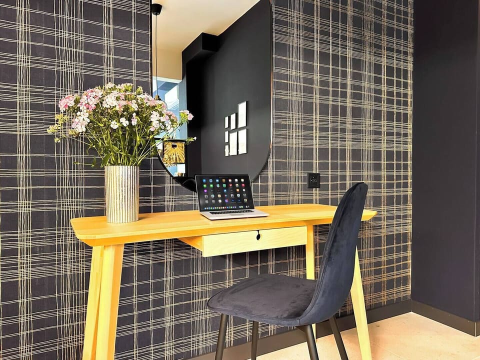 Stay productive at this stylish desk, ideal for remote work or journaling. Need café or coworking tips nearby? Let us know!