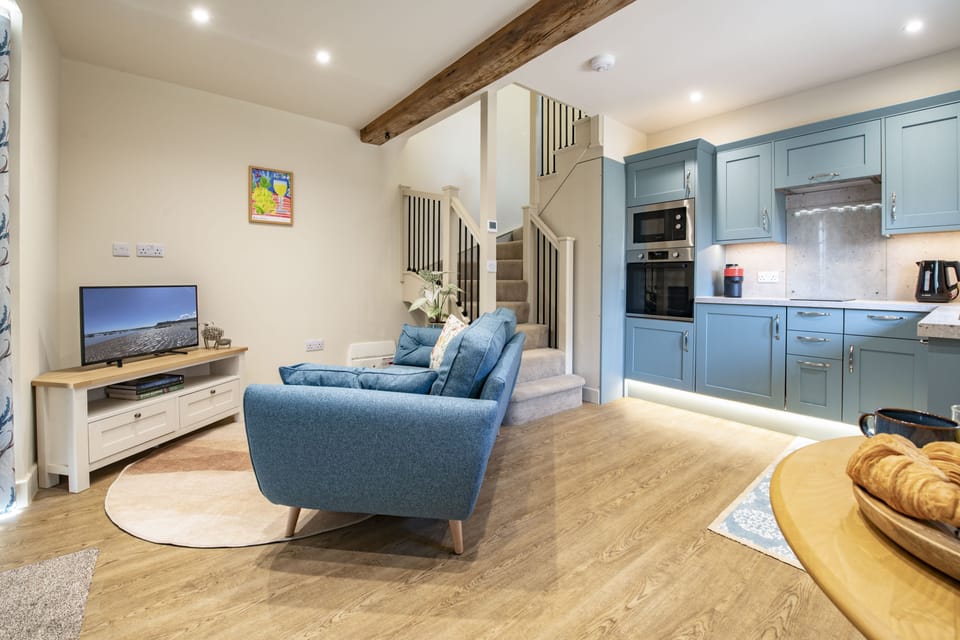 Ground floor: Enter from the patio into the open-plan living area