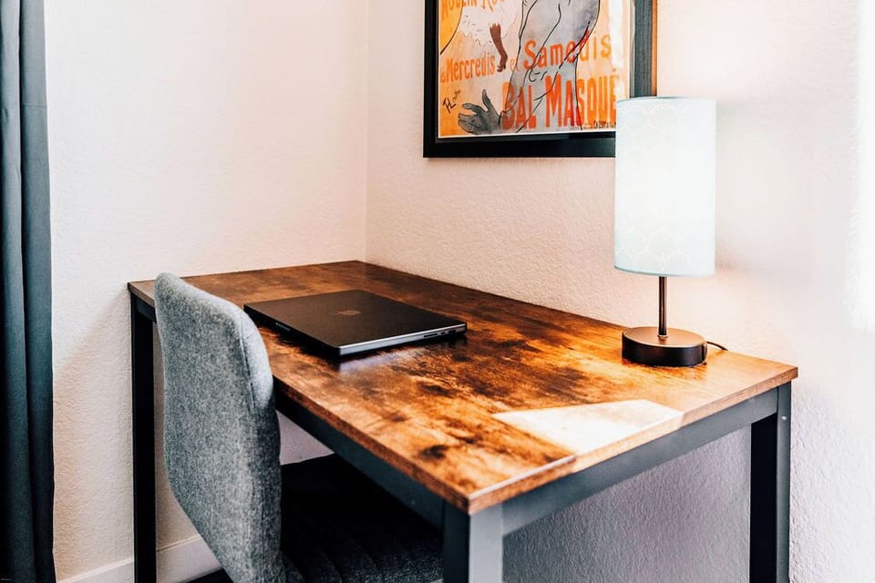 Dedicated office space in bedroom 1 - large desk and office chair