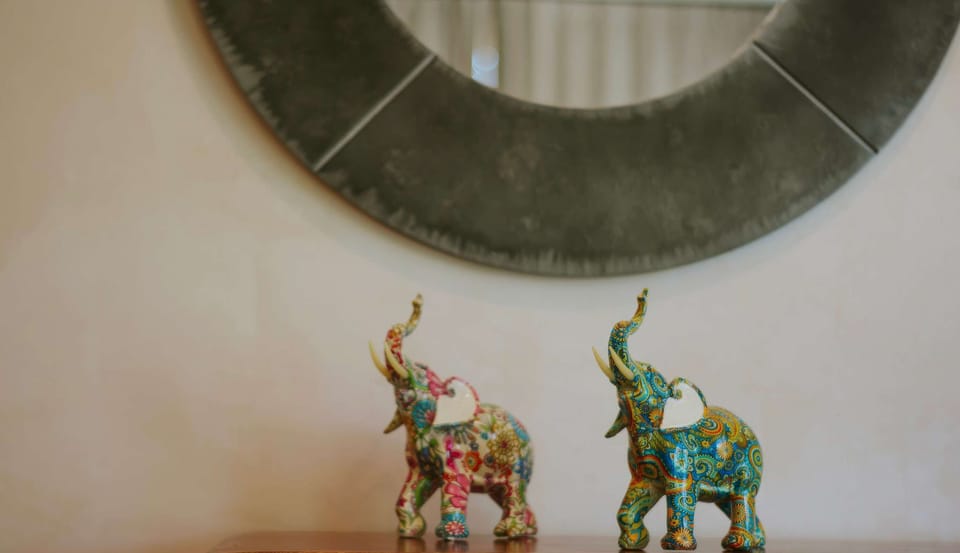 Thoughtfully curated decorative touches throughout the space create a warm and stylish ambiance.