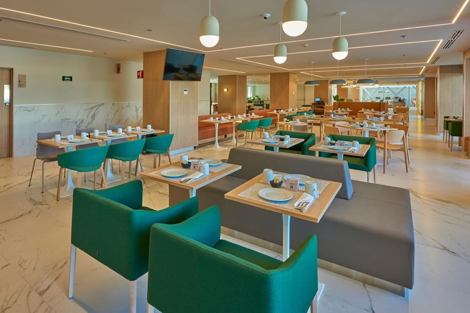 Gather for leisurely meals in a bright, spacious dining hall.