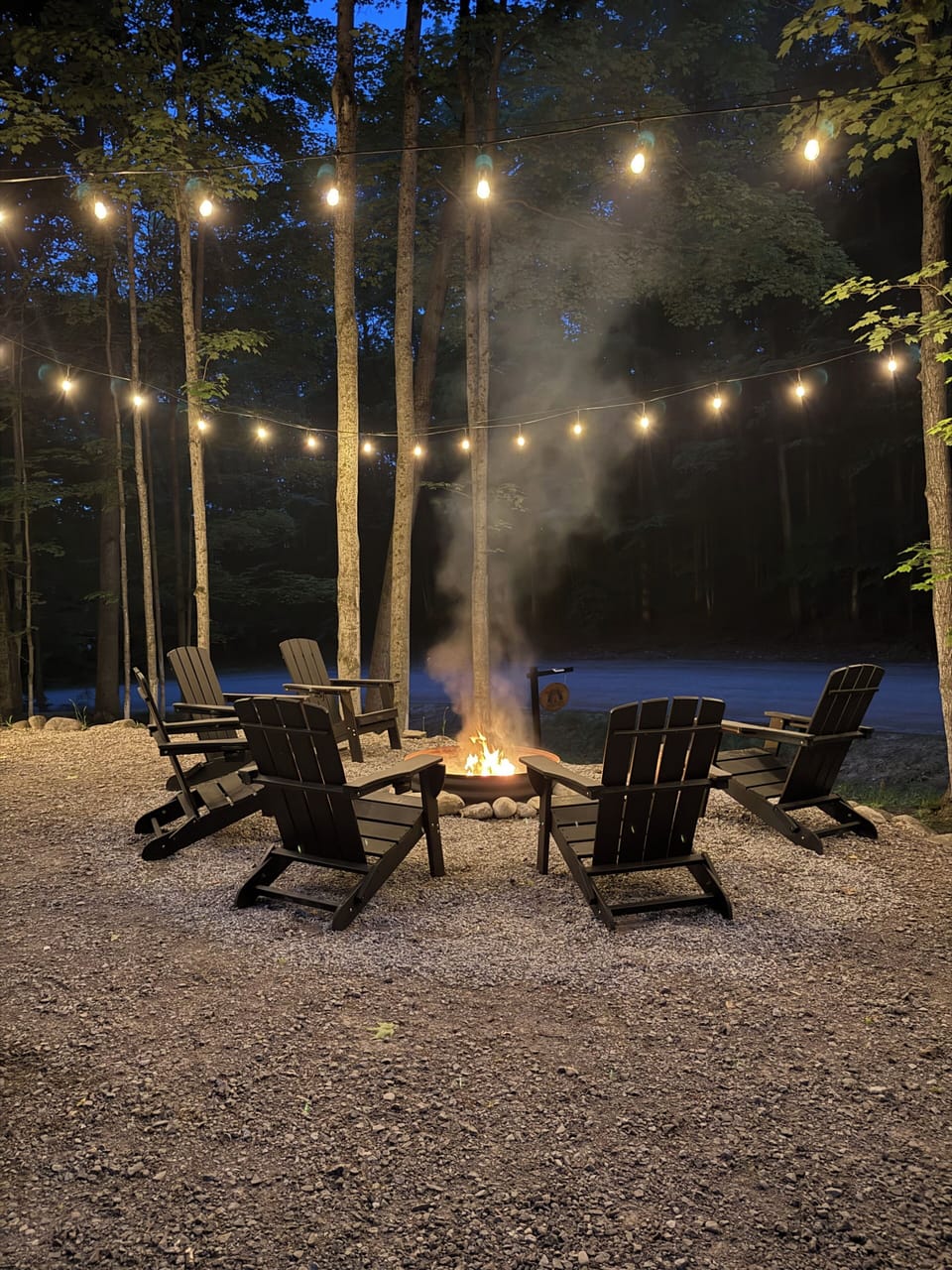 Roast s'mores, share stories by the fire, and unwind beneath the string lights after a day of exploring Torch Lake, Bellaire, and Schuss Mountain.