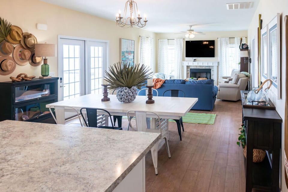 Bright open layout connecting dining area and cozy living space