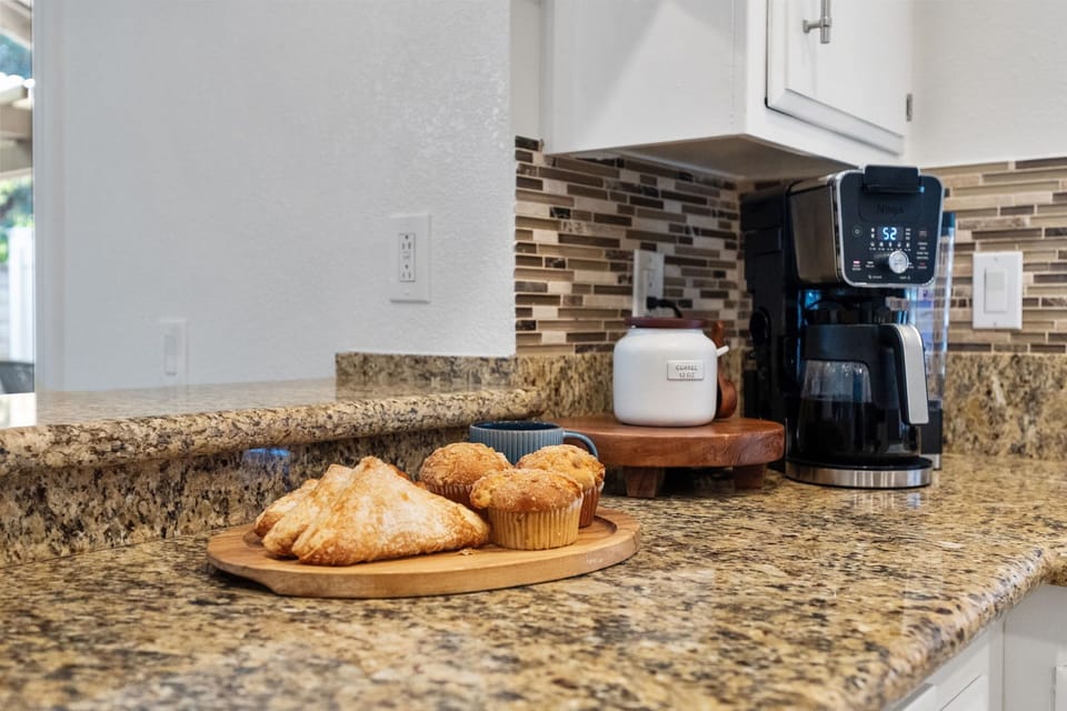 Kitchen: Fully equipped space with modern appliances for easy meal prep.
