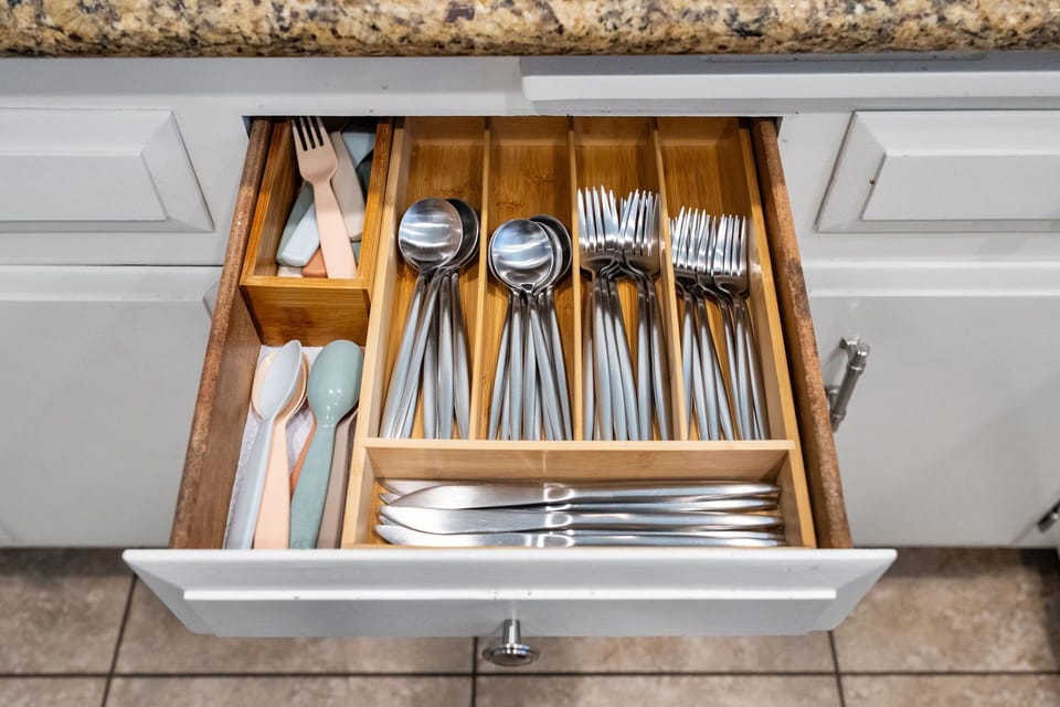 Utensils: Fully stocked with spoons, forks, and knives for every meal.
