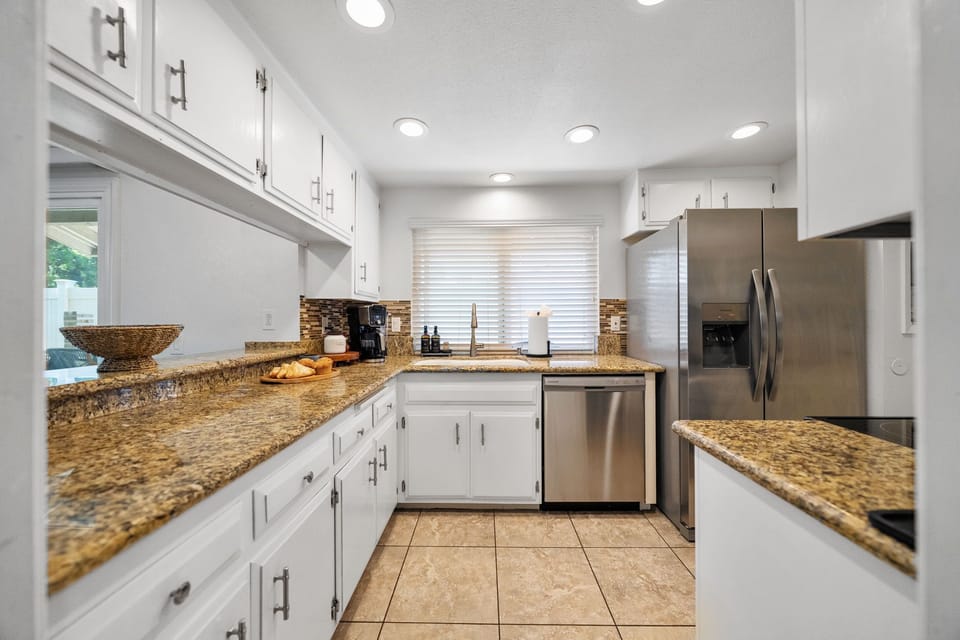 Kitchen: Fully equipped space with modern appliances for easy meal prep.
