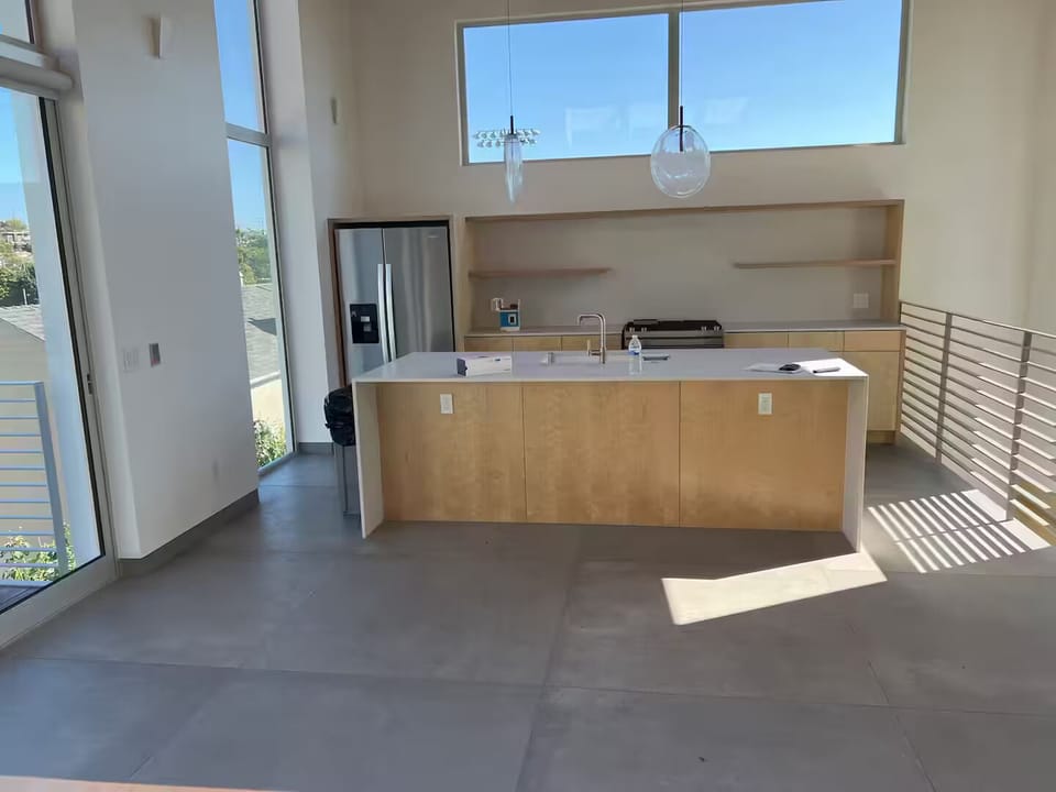 Upstairs living area and kitchen