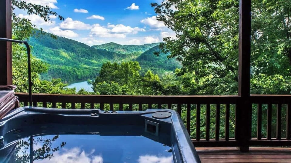 Hot tub with mountain views.