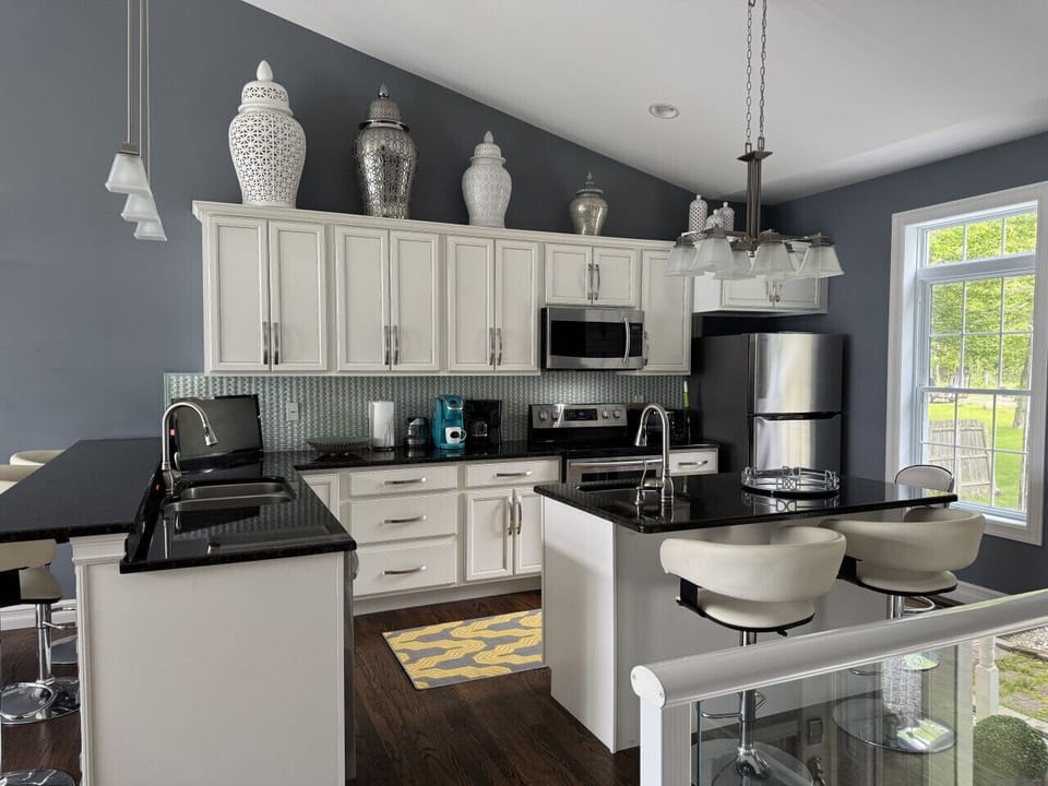 Kitchen with dishwasher and full size fridge