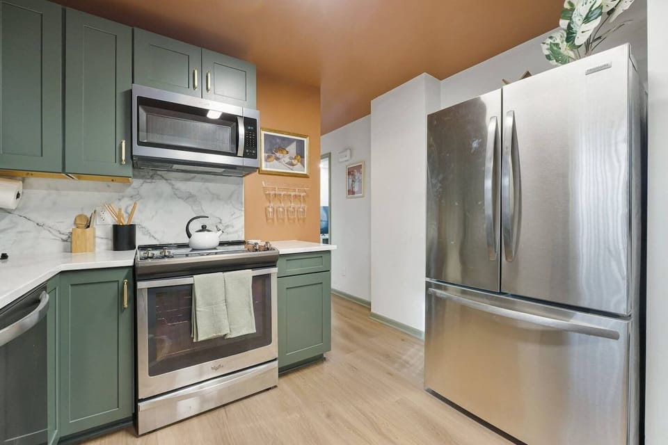 Meal prep is a breeze with premium stainless steel appliances and an electric stove. We stock this Fort Wayne kitchen with all the essential cookware to feed a group of ten.