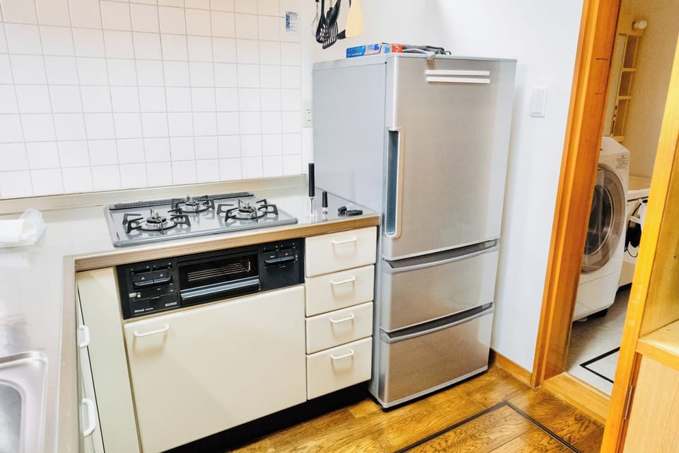 Gas range and refrigerator