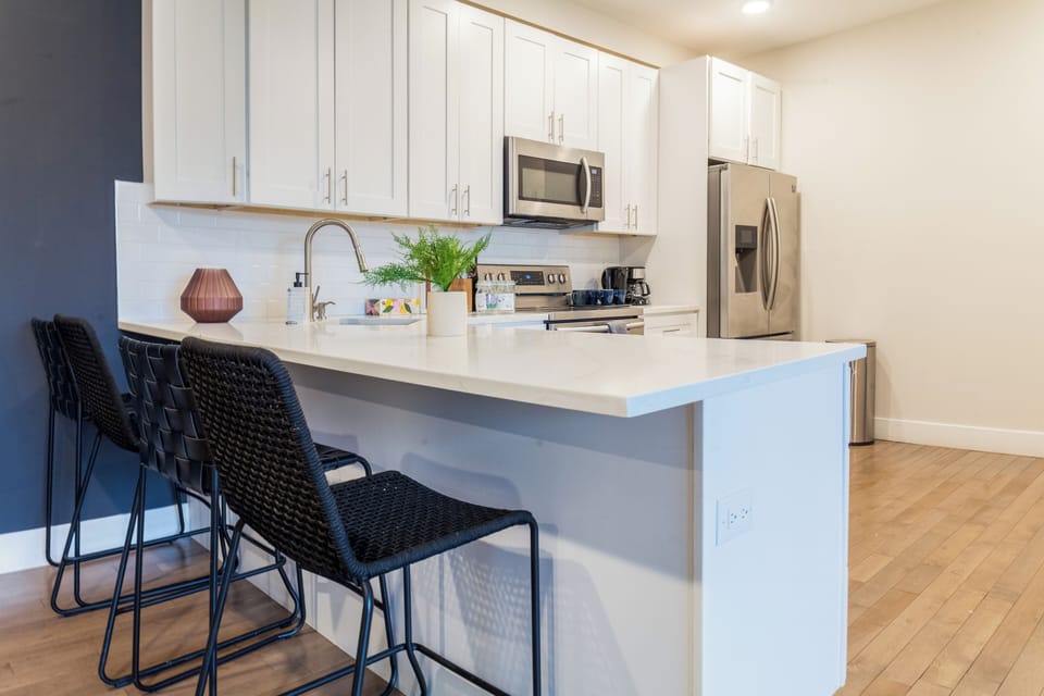 Ample storage meets modern design, cabinets that make tidying up effortless. #SmartStorage #ClutterFree #HomeOrganization