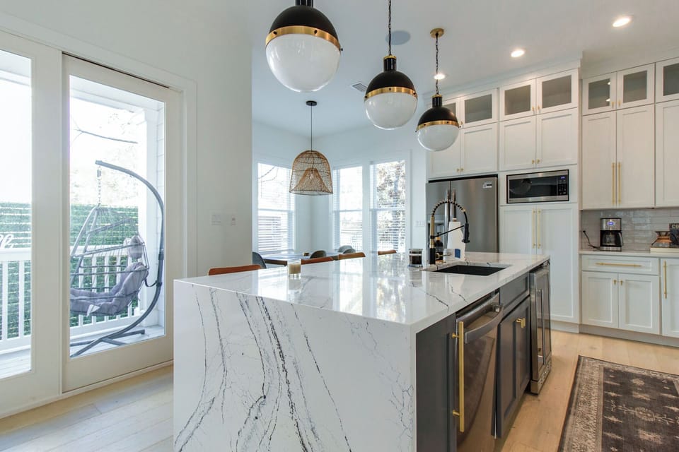 Waterfall Quartz counters, wine fridge
