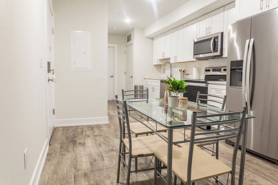 Comfortable dining space with a table and chairs, perfect for enjoying meals together.