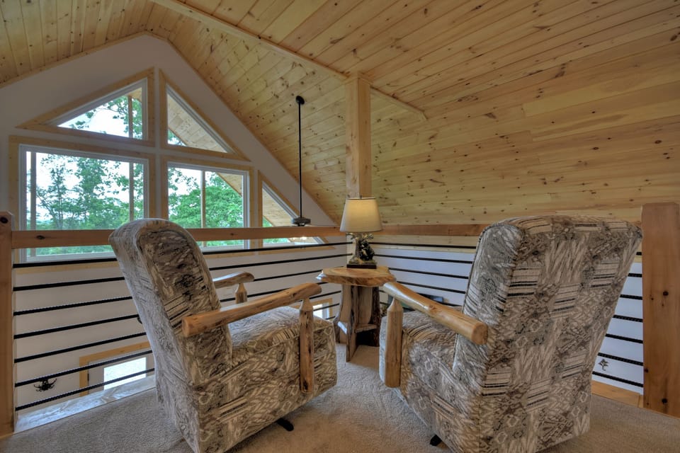Loft area with additional seating, and a TV—great for kids, or teens on your family-friendly Ellijay cabin vacation