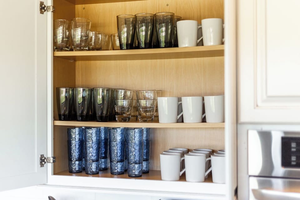 Enough mugs and glasses for up to 26
