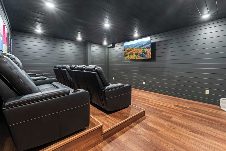 Bring the popcorn! This cozy theater room makes every night a premiere. (House 1)