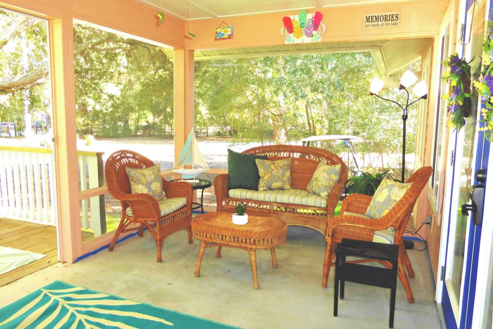 Relax on the front porch, enjoy the peace while enjoying a view of the lake