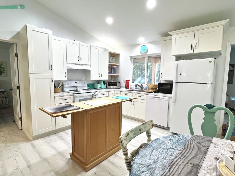 A compact open kitchen has all the conveniences of home.