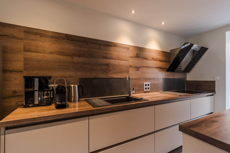 Fully equipped open kitchen, perfect for preparing Savoyard specialties.