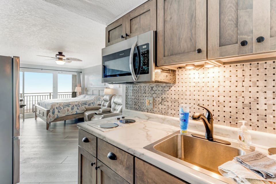Cozy kitchen with everything you need for beachfront meals.