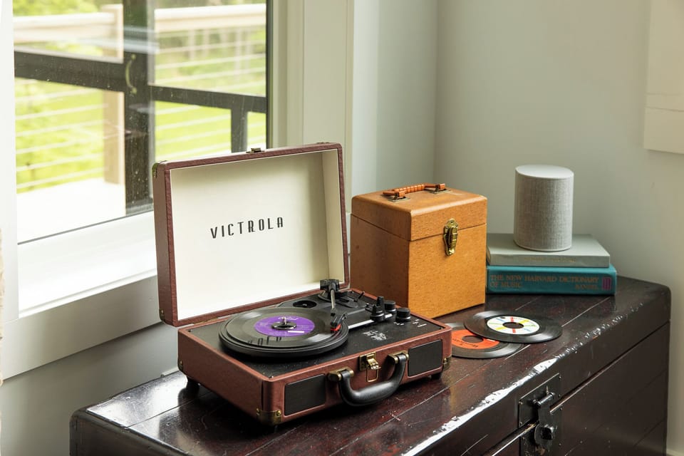 Vintage charm: spin vinyl on our Victrola for a classic soundtrack to your stay.