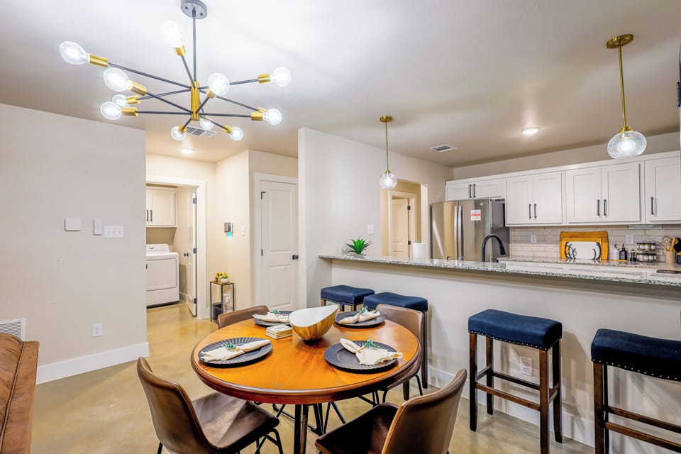 Dine in style with seating for everyone at the table and breakfast bar.