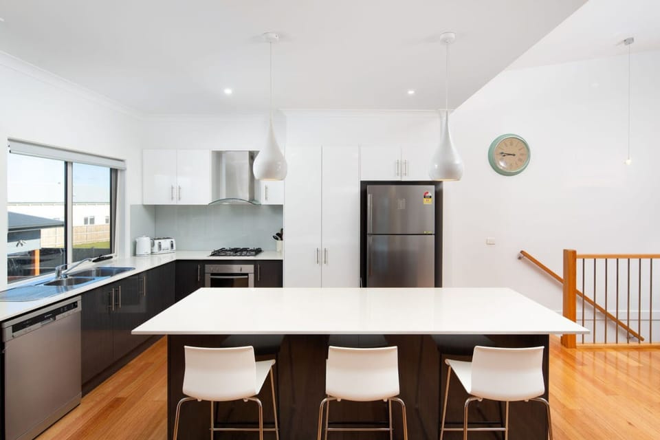 Wake up to the breakfast spot for 3 and dining table in the same space