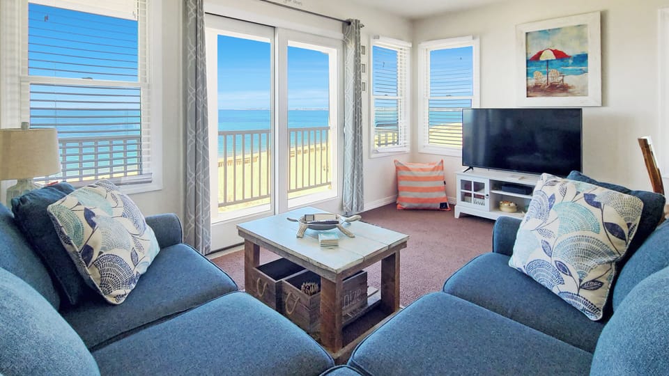 Enjoy beautiful Cape Cod Bay views from the living room and balcony deck