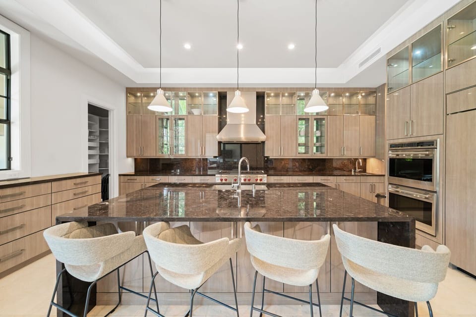 Fully stocked kitchen with all premium appliances including built in espresso machine, gas BBQ grill and sub zero fridge freezer
