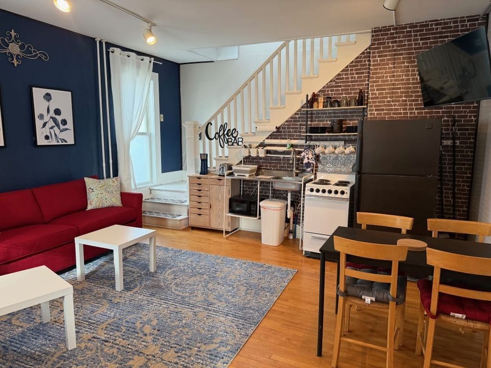 Kitchen, dining and seating. Couch has pull out bed.