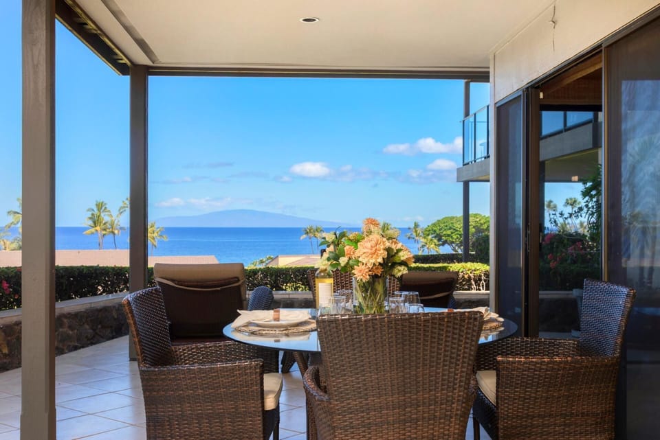   This lanai doesn't just overlook the ocean—it connects you to it, with every breeze echoing 'Aloha'   WEV-2009