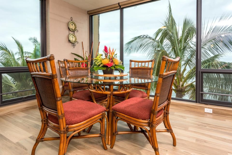Dine among the treetops with panoramic ocean views, where every meal is serenaded by waves and rustling palms MAH-419