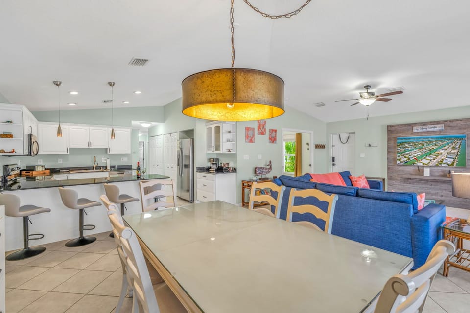 Dining area with kitchen and living area