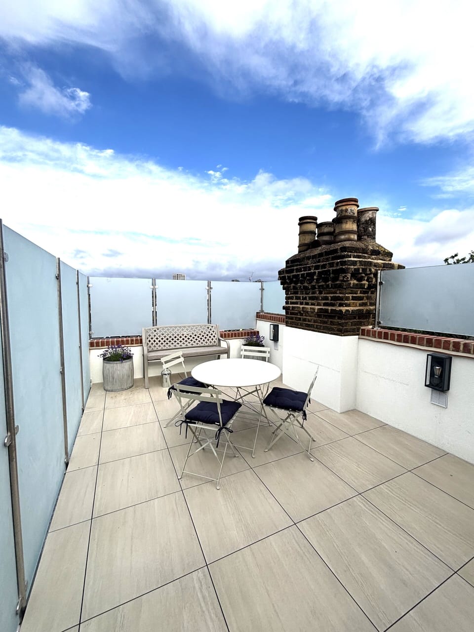 Roof Terrace with tables and bench