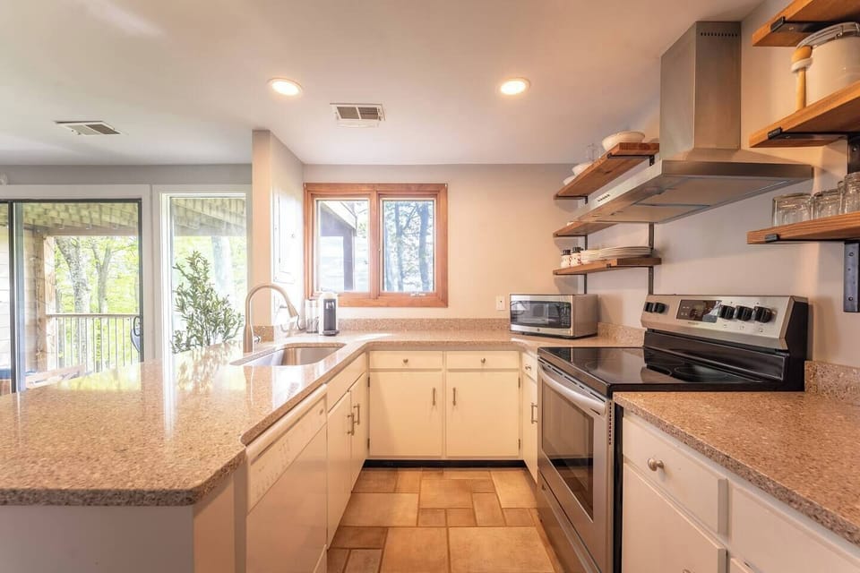 Open plan. Kitchen with plenty of counterspace to prep any meal! 