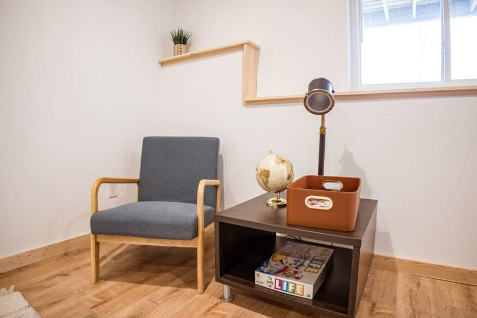 Find your calm in this cozy window nook — the perfect spot to unwind with a warm drink or a good read.