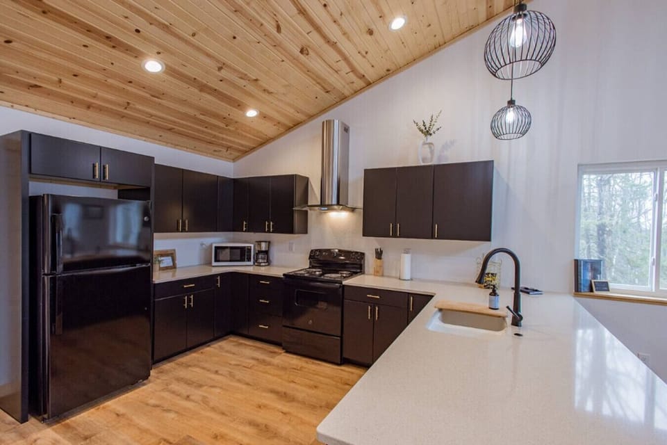 Fully equipped kitchen — perfect for cooking your favorite meals and gathering around!