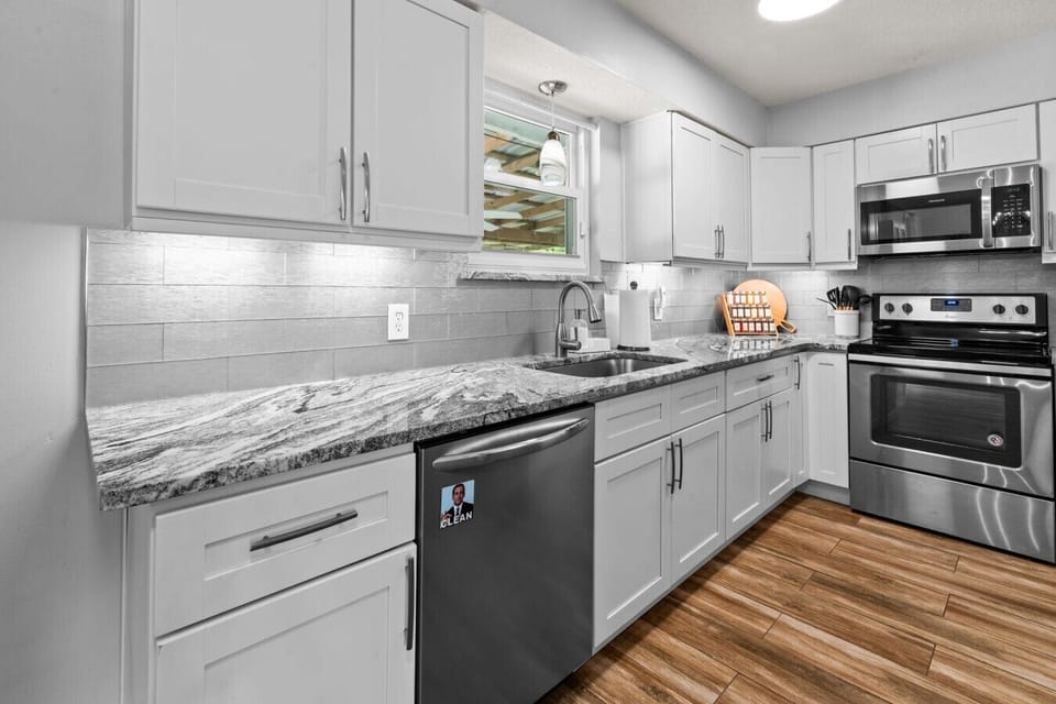 Fully stocked kitchen with everything you need — cook a great meal, sip a glass of wine, or just enjoy the space with friends and family.