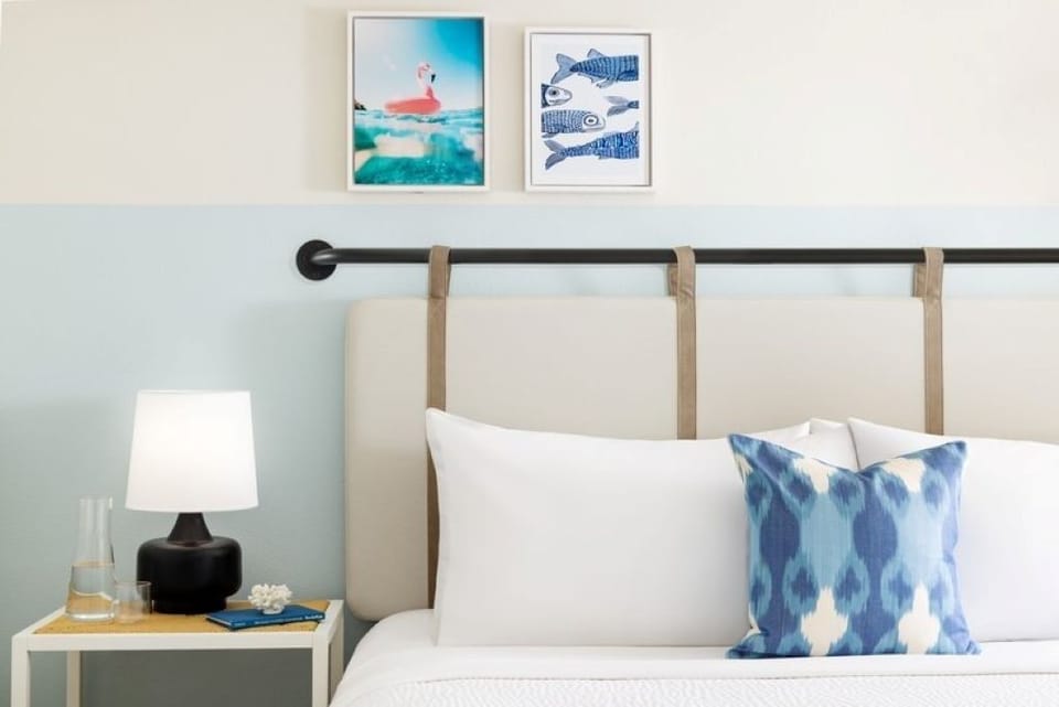 Drift off surrounded by calming art and boutique details.