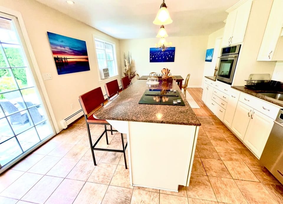 Kitchen with center island with seating